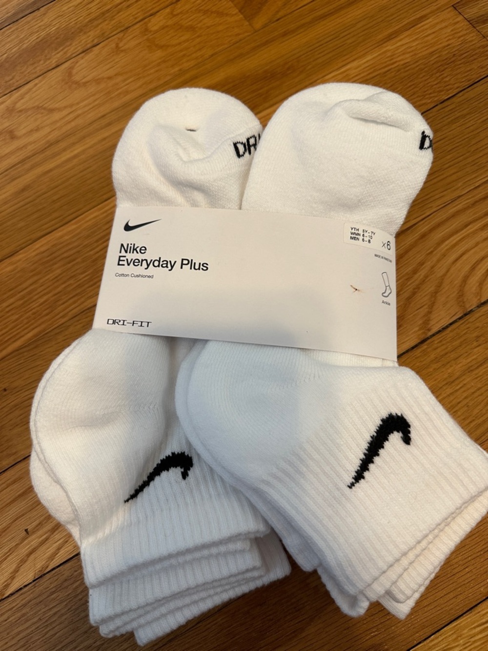 Nike White Low-Cut Athletic Socks with Black Swoosh (6 Pack)